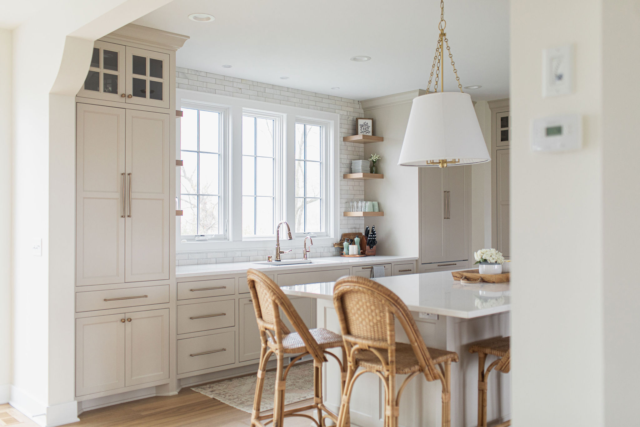 alma-homes-the-lake-loft-beige-kitchen-retractable-cabinetry